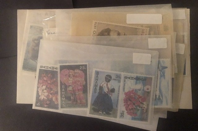 Lot of International Stamps In Glass Scenes Some Have Nice Value