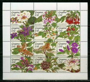 GUYANA  FLOWERS  SHEET  OF TWELVE STAMPS   MINT NH 