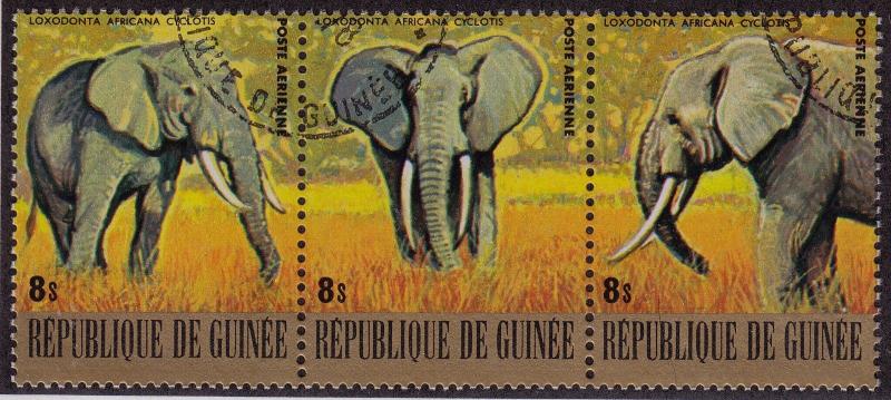 GUINEA GUINEE CTO Scott # C138 Elephants strip of 3 (3 Stamps)  (4)