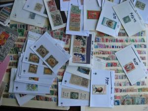 WW boxlot stamps in glassines,sales cards,stock pages,what lurks? Check them out