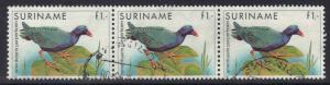 Surinam  #725  used  1985  birds  1g strip of 3 . grouse