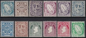 Sc# 65 / 76 1922- 23 Ireland Sword, Map, Coat of Arms, Cross set CV $143. Stk 1