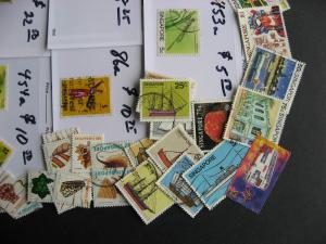 Singapore 50 different stamps plus $100 catalogue value of high values too!