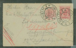 Austria 78 30 heller red violet (78) pays Express fee on this 10 heller domestic letter card.  Znama (Moravia) to Hungary.  1906