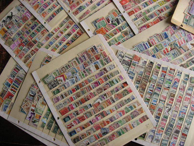 WW boxlot stamps haphazardly stuck into stock pages,no apparent order,what lurks