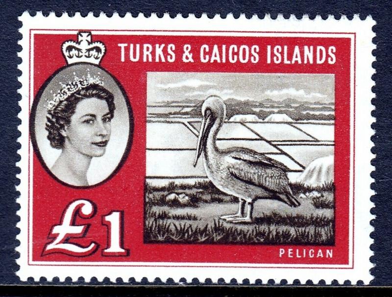 TURKS & CAICOS — SCOTT 135 (SG 253) — 1960 £1 PELICAN — MH — SCV $55.00