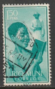 RIO MUNI 5, BOY READING AND MISSIONARY. USED. VF. (952)