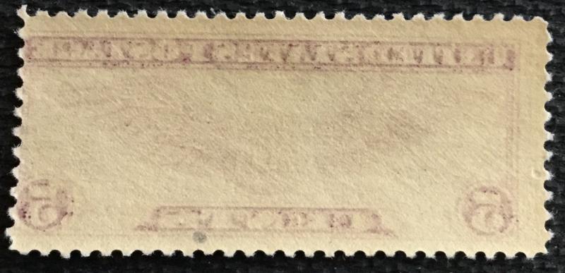 US #C12 MNH Single Winged Globe Ink spot under S SCV $17.50 L21