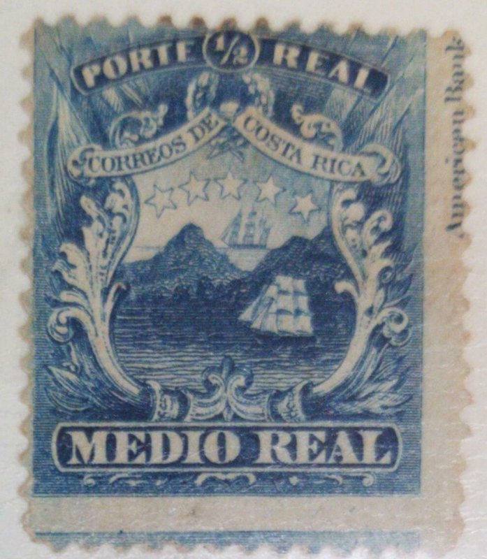 A) 1864, COSTA RICA, NATIONAL EMBLEM, IMPRESSION RUNNED TO THE LEFT SIDE AND CUT