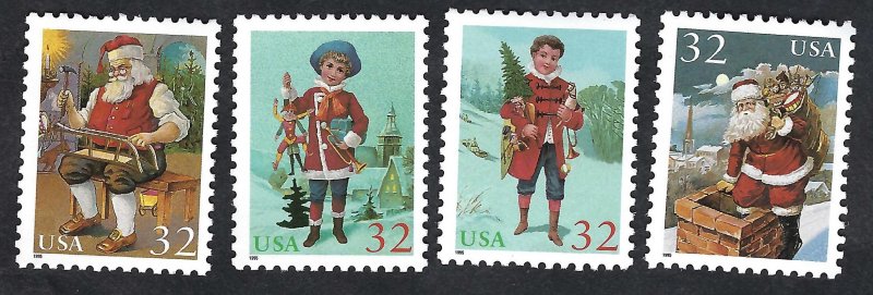 United States #3004-07 32¢ Santa and Children (1995). Four singles. MNH
