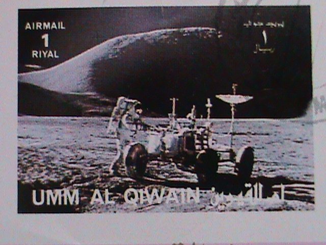 UMM AL QIWAIN AIRMAIL STAMP:   SPACE SHIP LANDING ON THE MON CTO MNH S/S #2