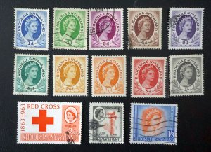 RHODESIA & NYASALAND Queen Elizabeth   Lot of 13 stamps  mixed MNH, MH, used