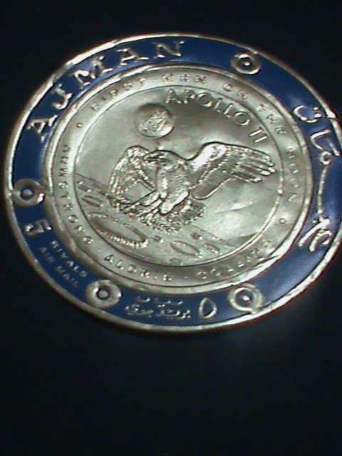 ​AJMAN-AIRMAIL-FIRST MAN ON THE MOON-APOLLO 11-ALUMINIUM REPLICA ROUND STAMP