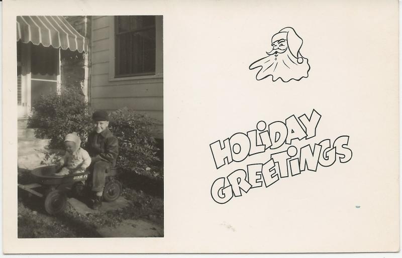 1940's RPPC Christmas Card Kids in Dixie Flyer Wagon Santa UNMAILED with writing