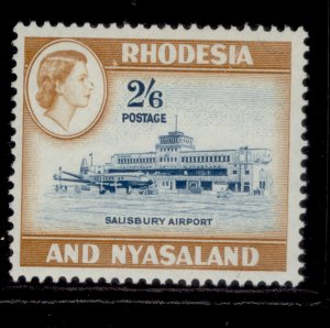 RHODESIA & NYASALAND QEII SG28, 2s 6d light blue & yell/brown NH MINT. Cat £13.