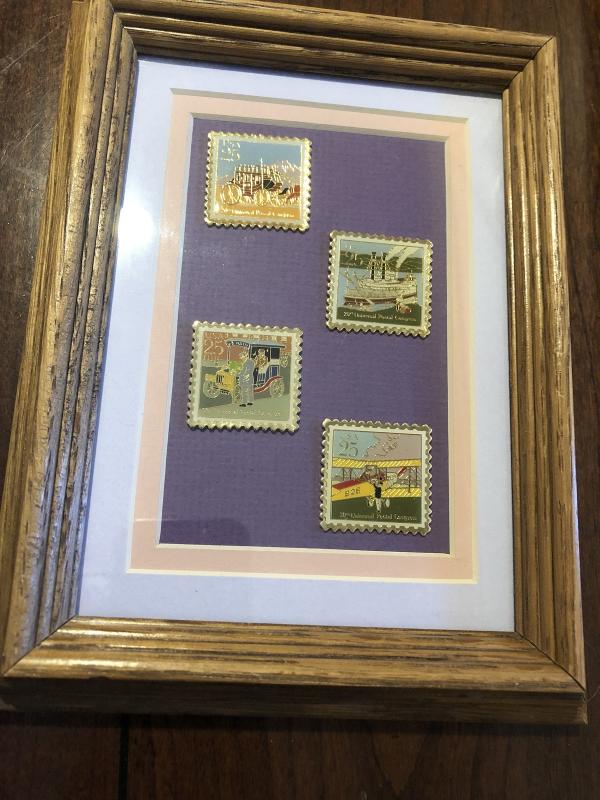 4 Classic Mail Transporataion Stamp Pins Under Glass in a Wood Frame