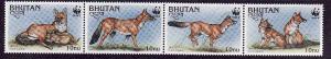 Bhutan-Sc#1149-unused NH WWF strip of 4 Foxes-Animals-1997-