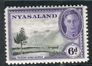 NYASALAND;  1945 early GVI issue fine Mint hinged 6d. value