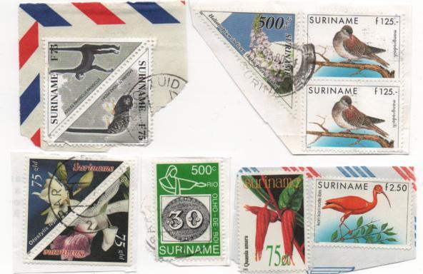 Suriname postage with post marks - nice used stamps