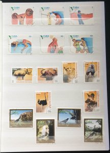 COLLECTION OF CUBA STAMPS IN AN ALBUM - 230 STAMPS - ALL SETS