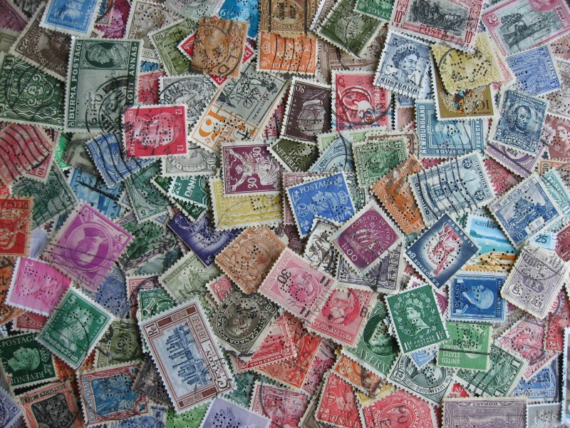 Worldwide perfins, 200 from various countries. Duplicates?, mixed condition.