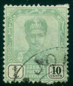 MALAYA JOHORE #44 10c green and black, used w/some paper stuck on reverse