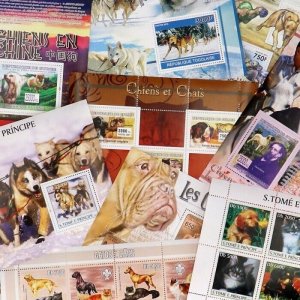 THEMATICS LOT -  DOGS       35 DIFF SETS             MNH **