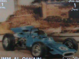 ​UMM AL QIWAIN-FAMOUS FORMULAR RACE CAR-MNH 3-D-RARE S/S-VF-HARD TO FIND