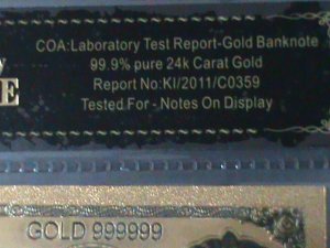 ​UNITED STATES- 24 KARAT GOLD REPLICA $1000 SILVER DOLLARS-VF WITH CERTIFICATE