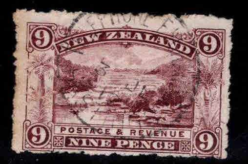 New Zealand Scott 117 Used  9p red violet perf tips toned at left