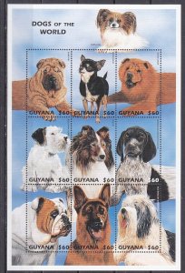 Guyana, Scott cat. 3230 a-i. Dogs of the World sheet of 9.