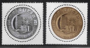 Malaysia Scott 82-83 MH* round stamp set