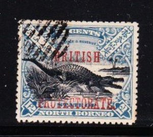 Album Treasures North Borneo Scott # 112 12c Crocodile Over Print VF Used