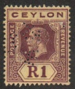 Ceylon 241a  Mint hinged. Perfin. Scrape