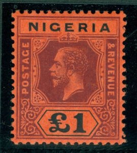 SG 12 Nigeria 1914-19. £1 deep purple & black/red. A fine lightly mounted...
