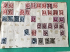 Belgium pre cancel stamps on old album part pages Ref A8462