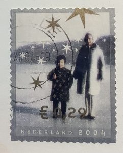 Netherlands 2004 Scott 1180d used - December stamp, Girl & Woman on the Ice