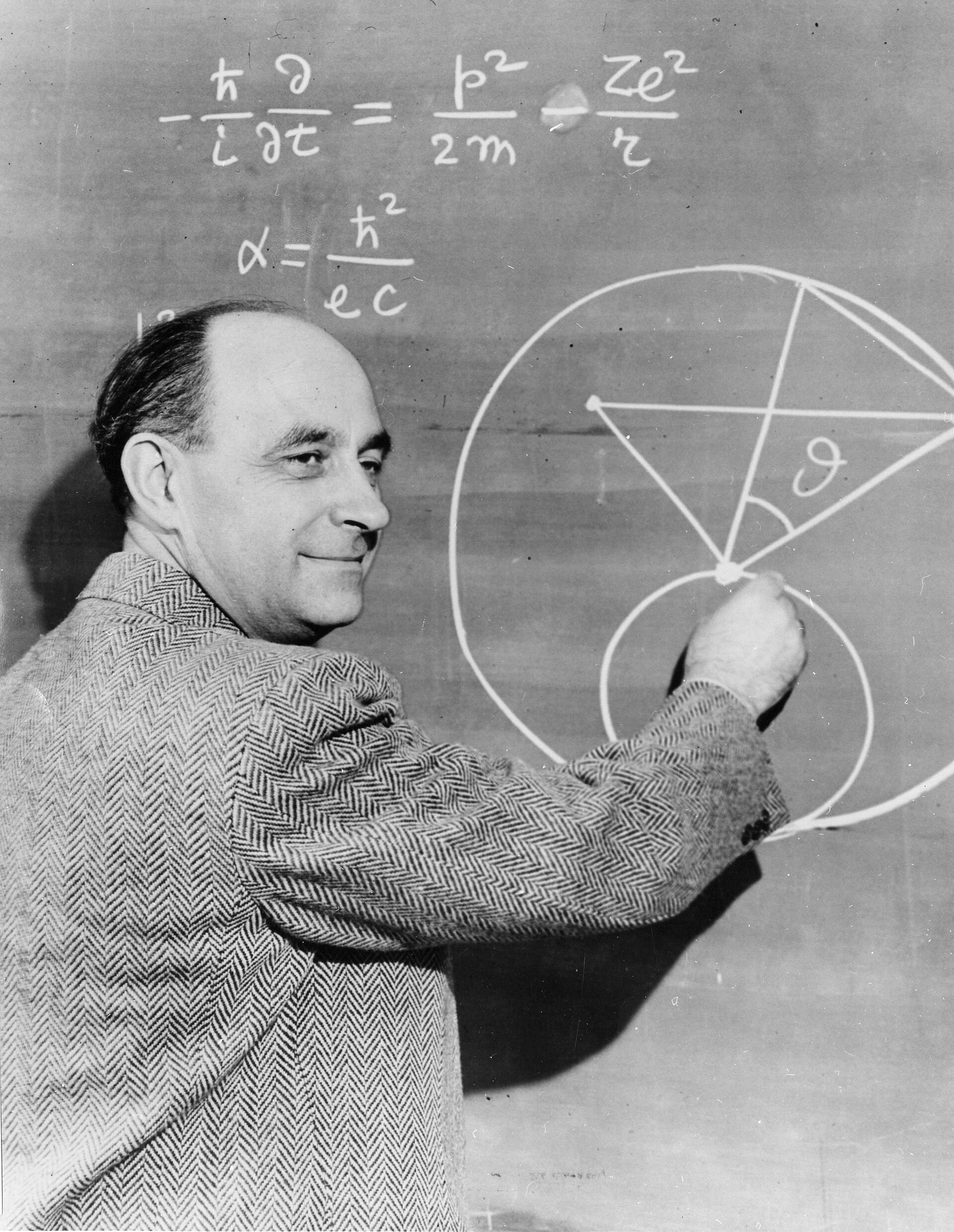 Enrico Fermi at the blackboard.