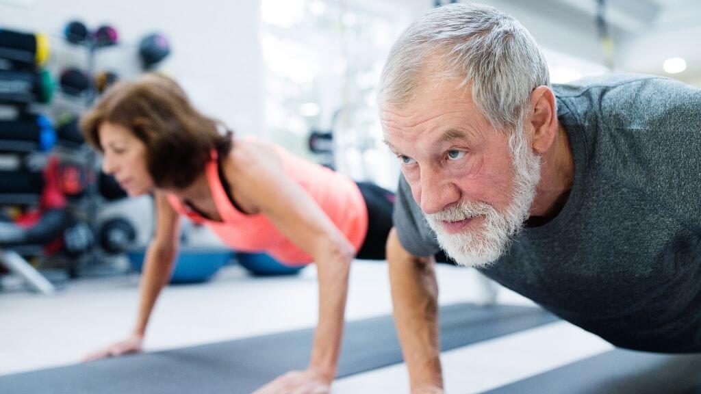 a man and a woman exercising