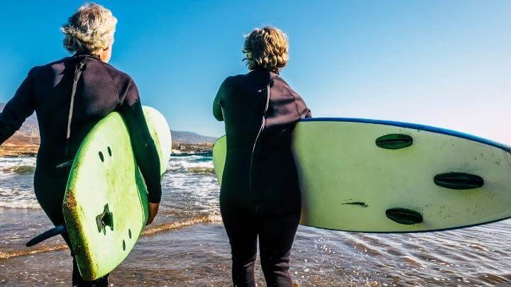 Elderly surfer couple