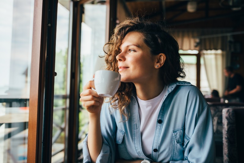 woman holding a mug