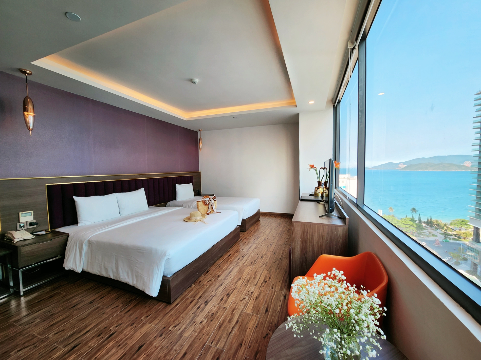 Hình ảnh phòng Premie Deluxe Triple Room with Partial Sea View