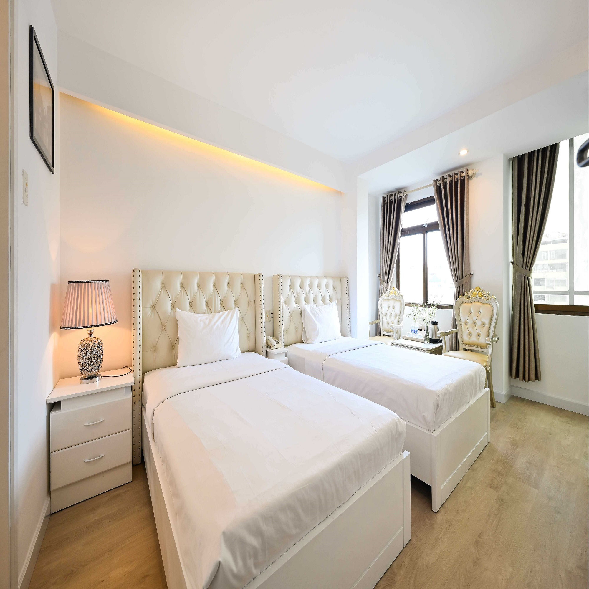Images des chambres Lits Jumeaux de Luxe avec Fenêtre