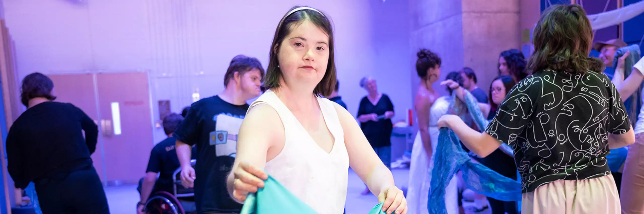 A woman with Down Syndrome dancing