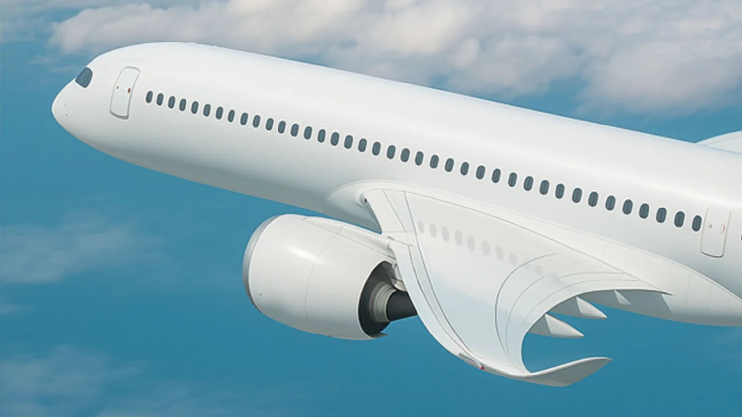 A white passenger jet in flight above the clouds