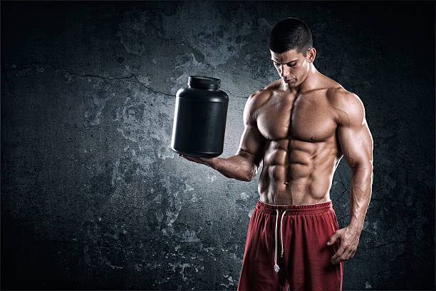 Bodybuilder posing, showcasing muscle definition and strength