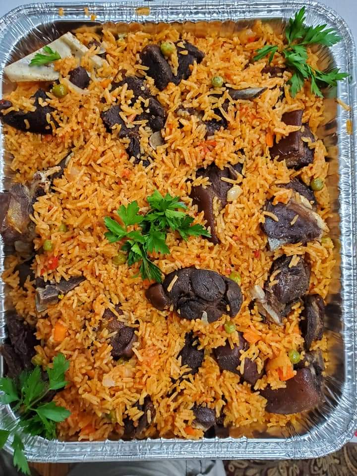 Jollof rice with meat and parsley