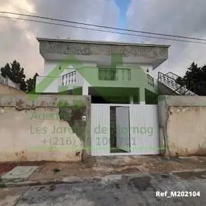 Une Maison d'une superficie 400M² situé à cité El Mahrajen Boumhel