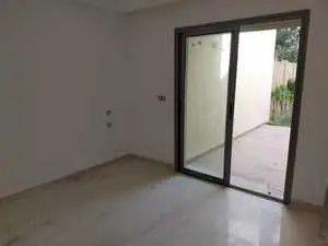 A vendre un appartement s+2 avec jardin