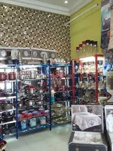 Une maison commercial avec 2 grandes boutiques à Nassen tel 99811625/54811627